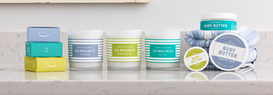 Coastal Calm®, Sea La Vie, Seaweed & Sea Salt bar soaps, candles, body butter on bathroom vanity