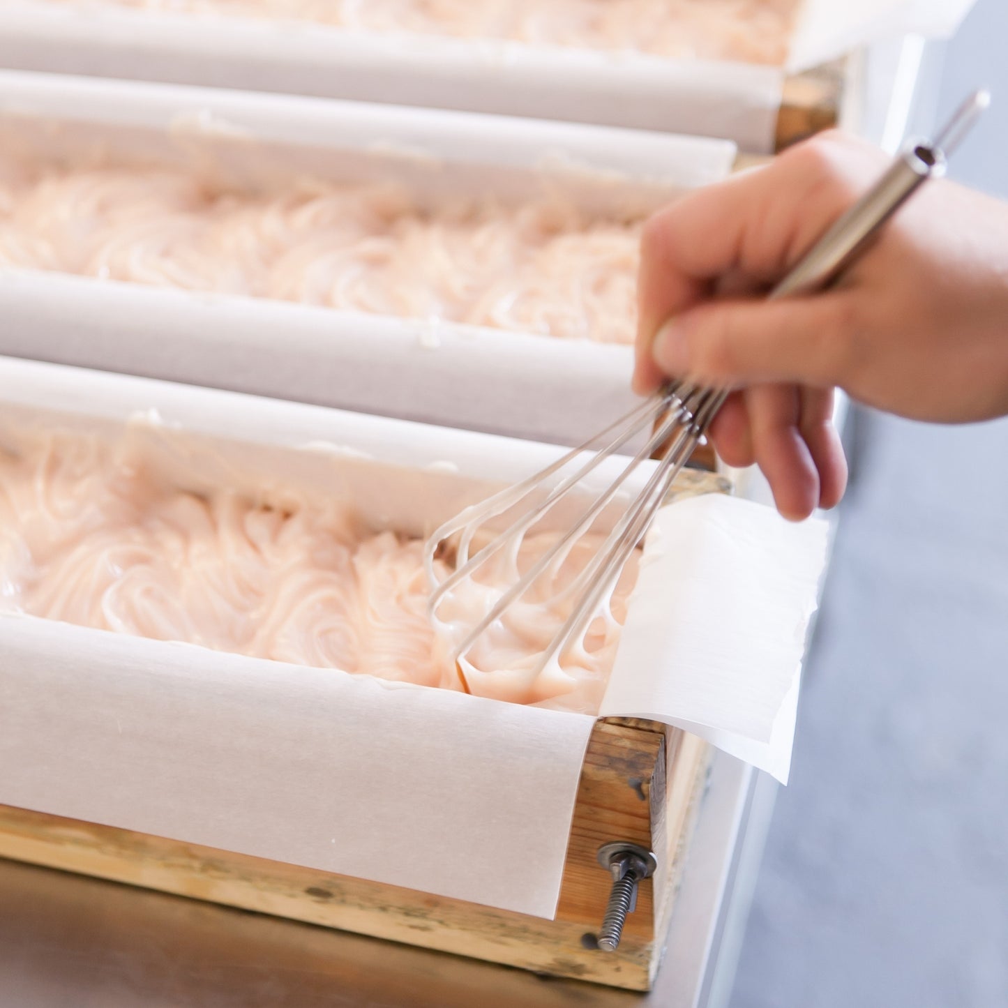 Whisking top of Magnolia Bar Soap loaf to create the signature wave on our Bar Soaps
