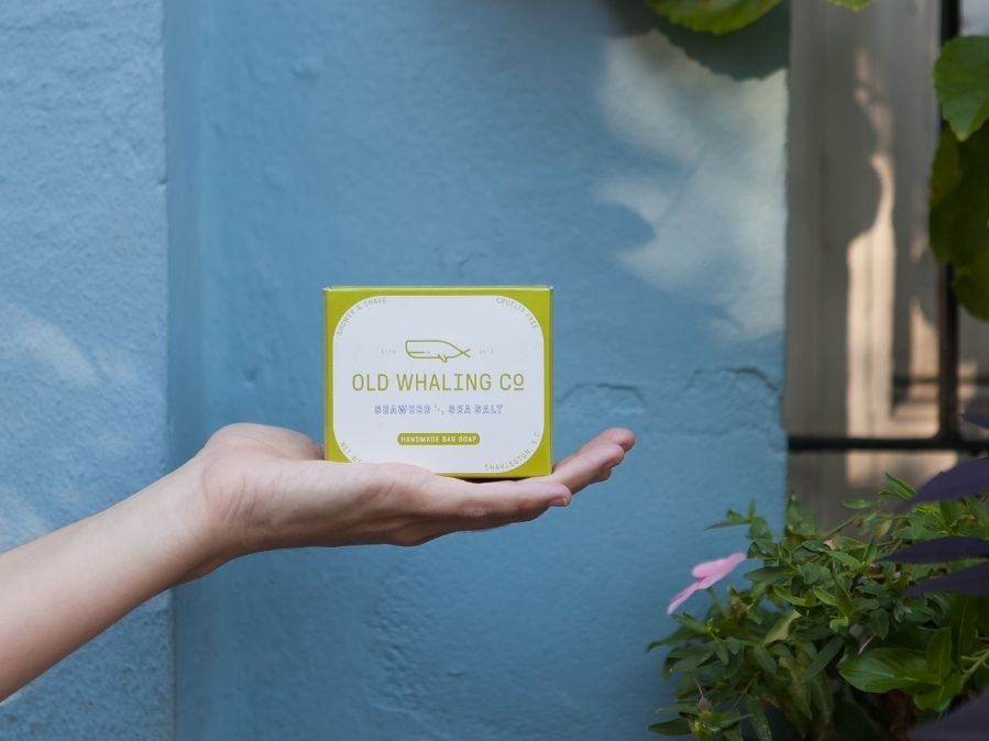 Seaweed & Sea Salt Bar Soap Handcrafted in Charleston, SC against blue wall in downtown historic Charleston