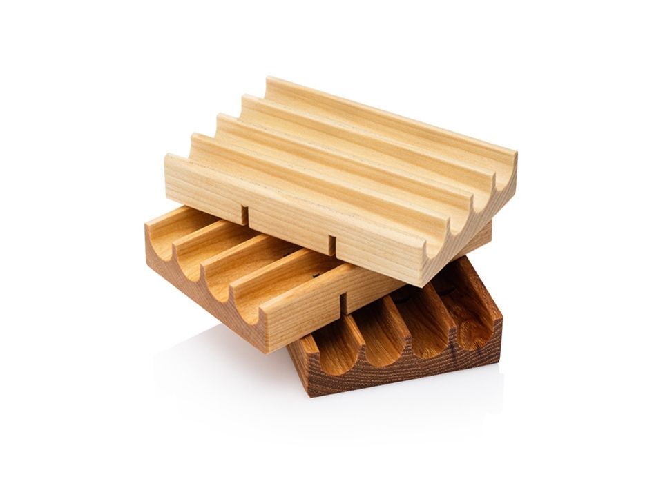Stack of three wooden soap dishes
