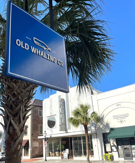 Old Whaling Co. blue and white retail store sign