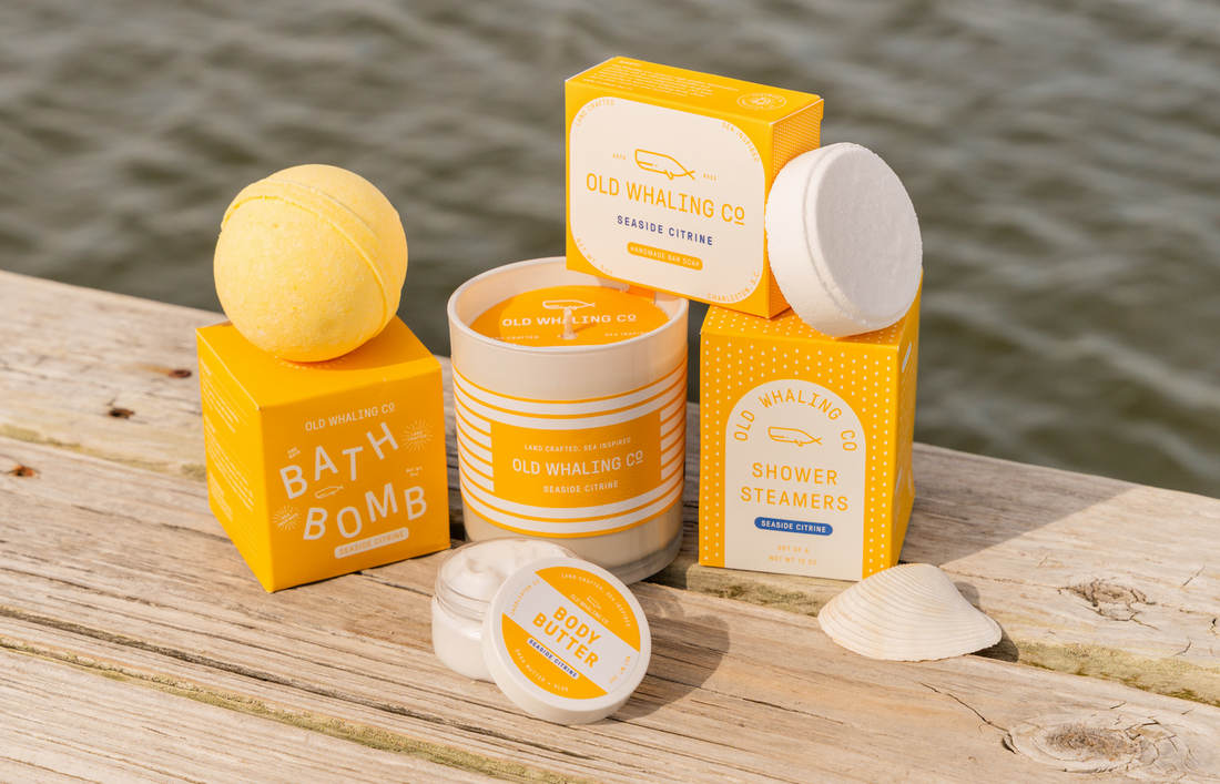 Old Whaling Company Seaside Citrine collection on display outside by the water in Charleston, SC, citrus sea-inspired scent