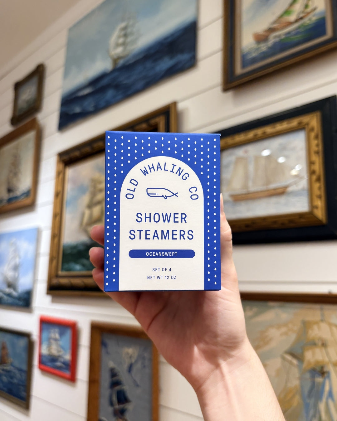 Hand holding Oceanswept® shower steamers