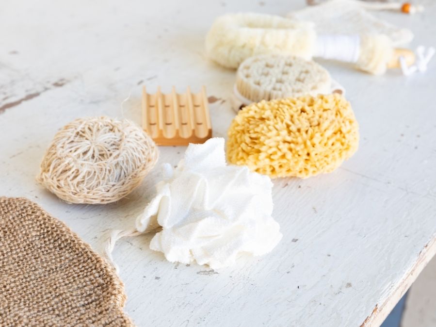 Bath Accessory FlatLay Wool sea sponge massaging dry brush bamboo loofah soap dish sisal exfoliating sponge hemp mitt