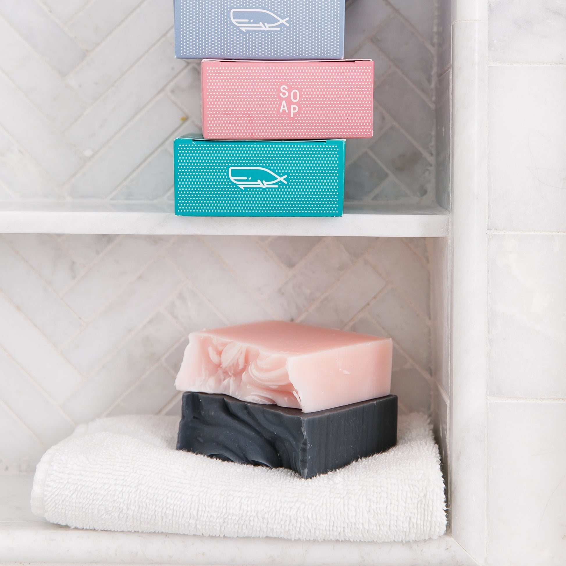 Bergamot & Grapefruit and Magnolia Bar Soaps on bathroom shelf