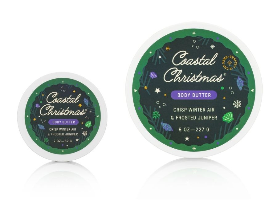 Two containers of Coastal Christmas body butter on a white background