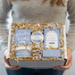 Kelly holding Old Whaling Company Coastal Calm® gift box 