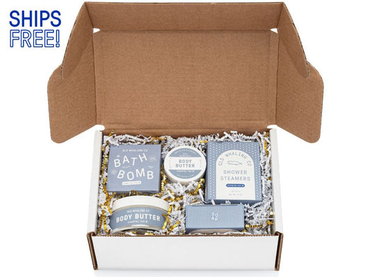 Old Whaling Company Coastal Calm® collection gift box in white box with white and gold crinkle paper