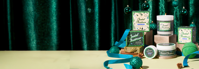 Coastal Christmas collection with green ornaments and blue ribbon