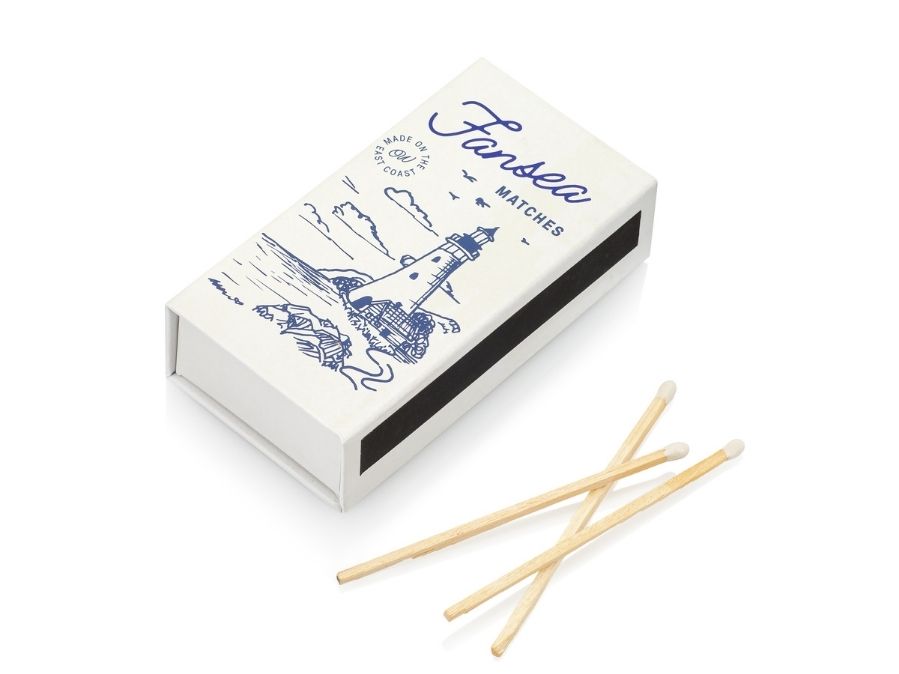 Cream Matchbox with matches on a white background