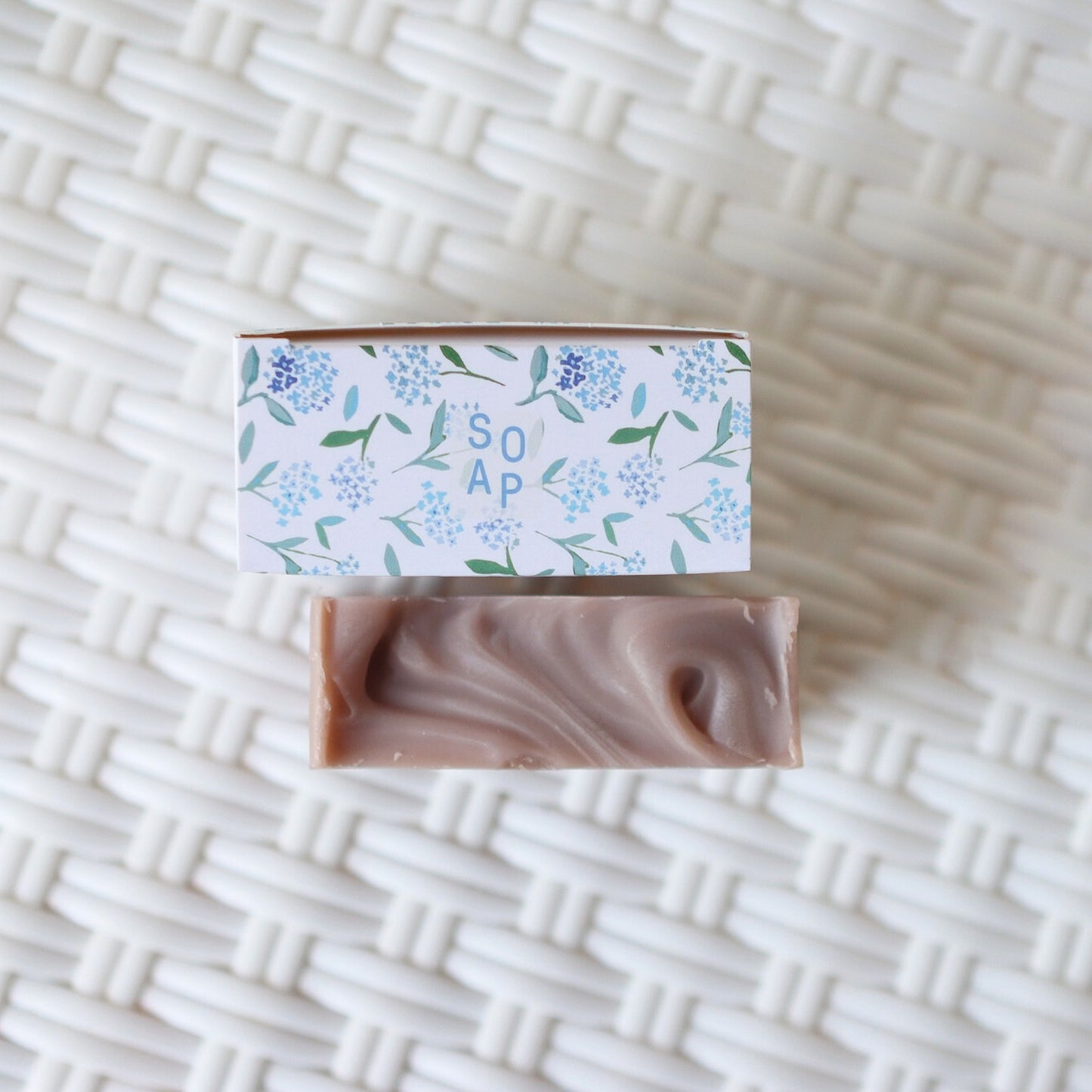 Top view of Floral Coast Soap and packaging
