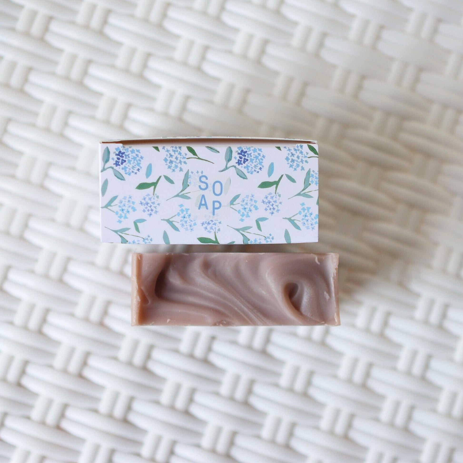 Top view of Floral Coast Soap and packaging