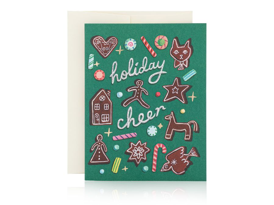 Red Cap Holiday Cheer Greeting Cards on white background, card has gingerbread cookie designs on a green background with "holiday cheer" written in cursive