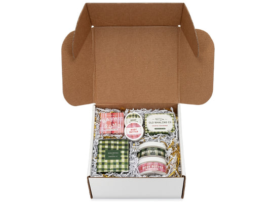 Old Whaling Company Holiday Gift Box Sugar Plum body butter and bath bomb Coastal Christmas candle body butter and soap in box with gold and white crinkle paper