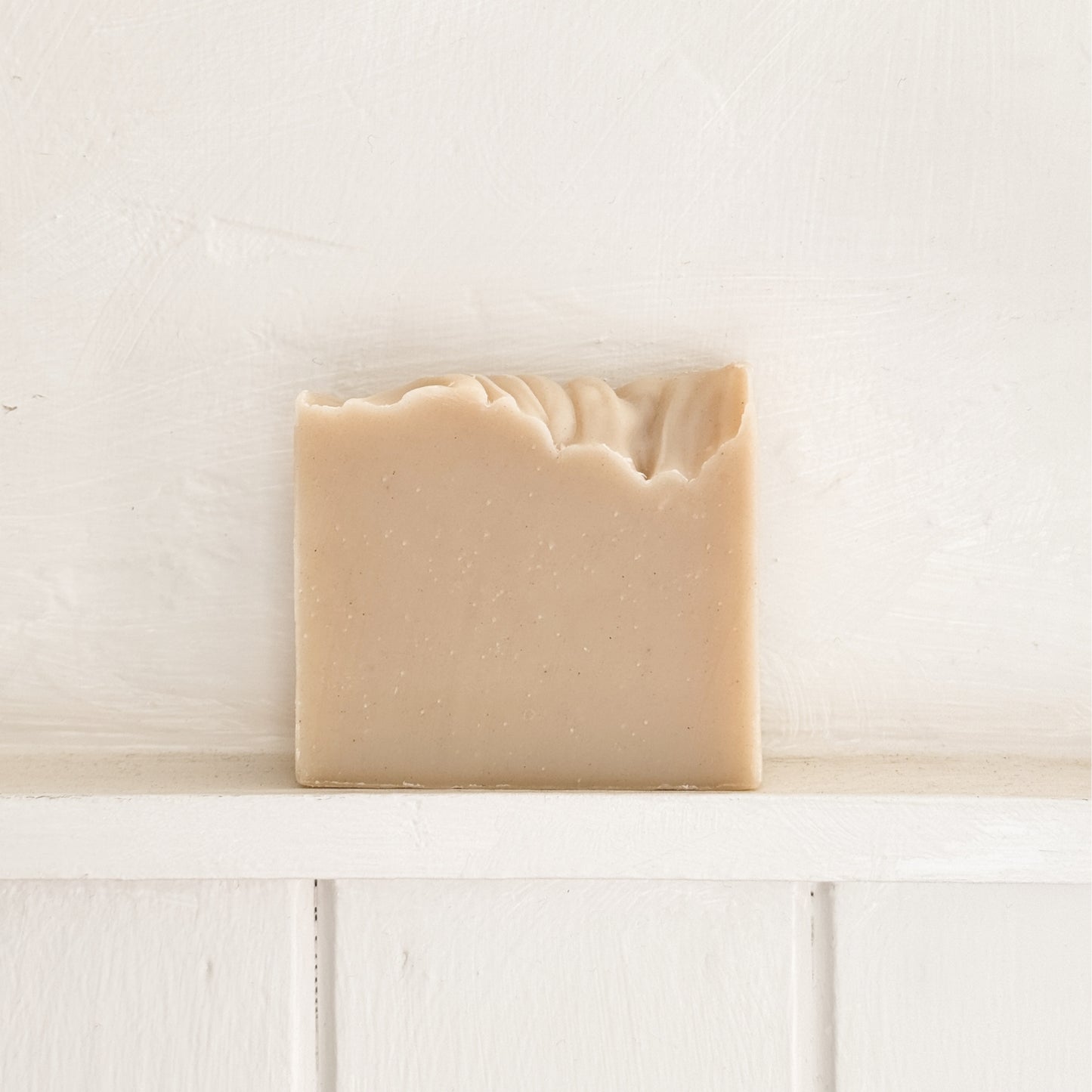 Unboxed Mariner's Moon Bar Soap sitting on white shelf