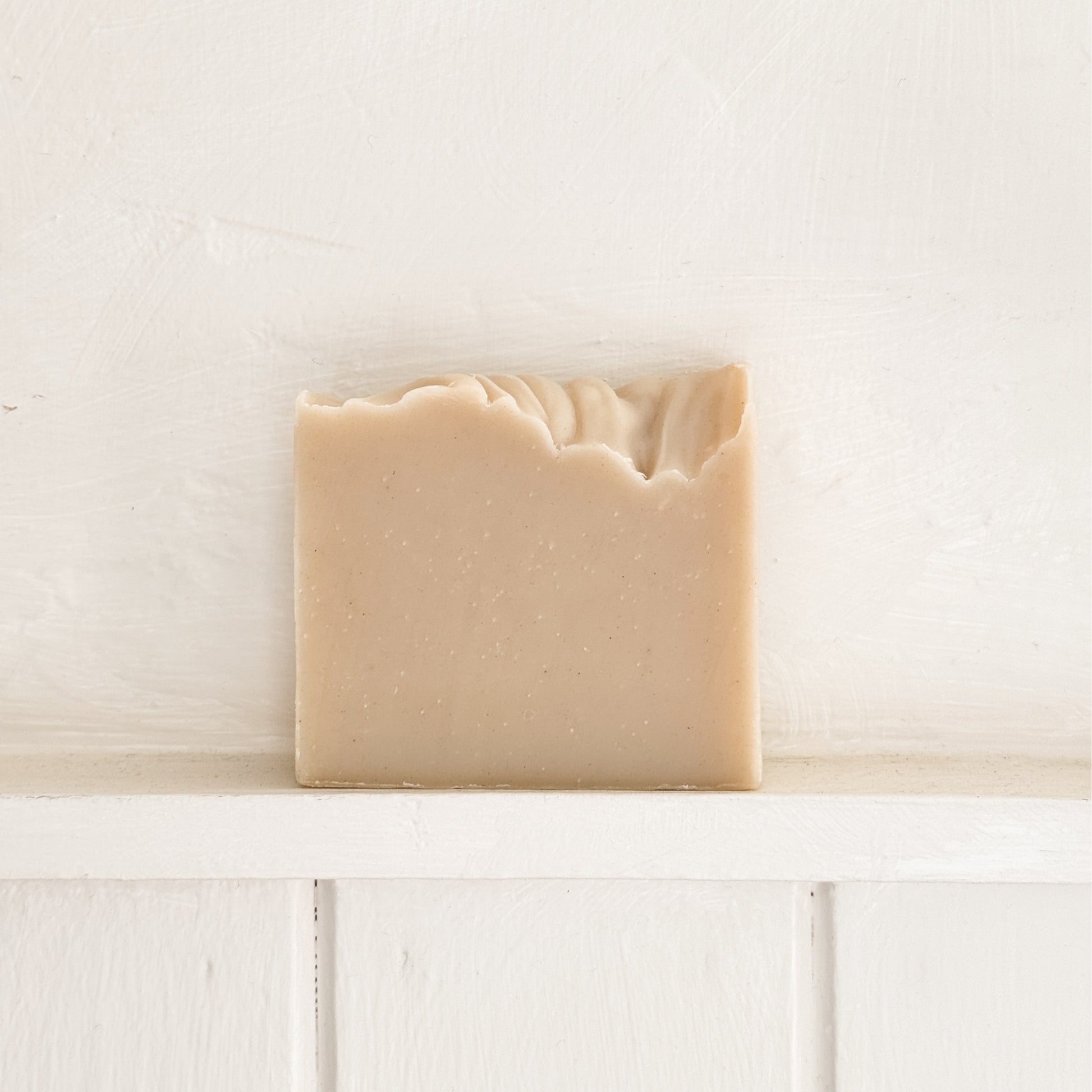 Unboxed Mariner's Moon Bar Soap sitting on white shelf