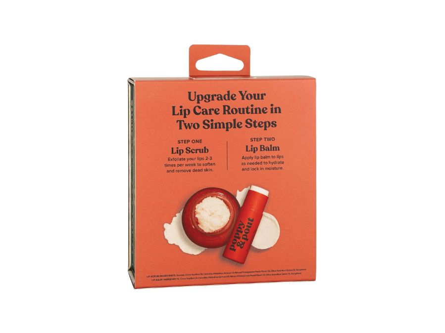 Lip care product set with scrub and balm on an orange packaging against a white background