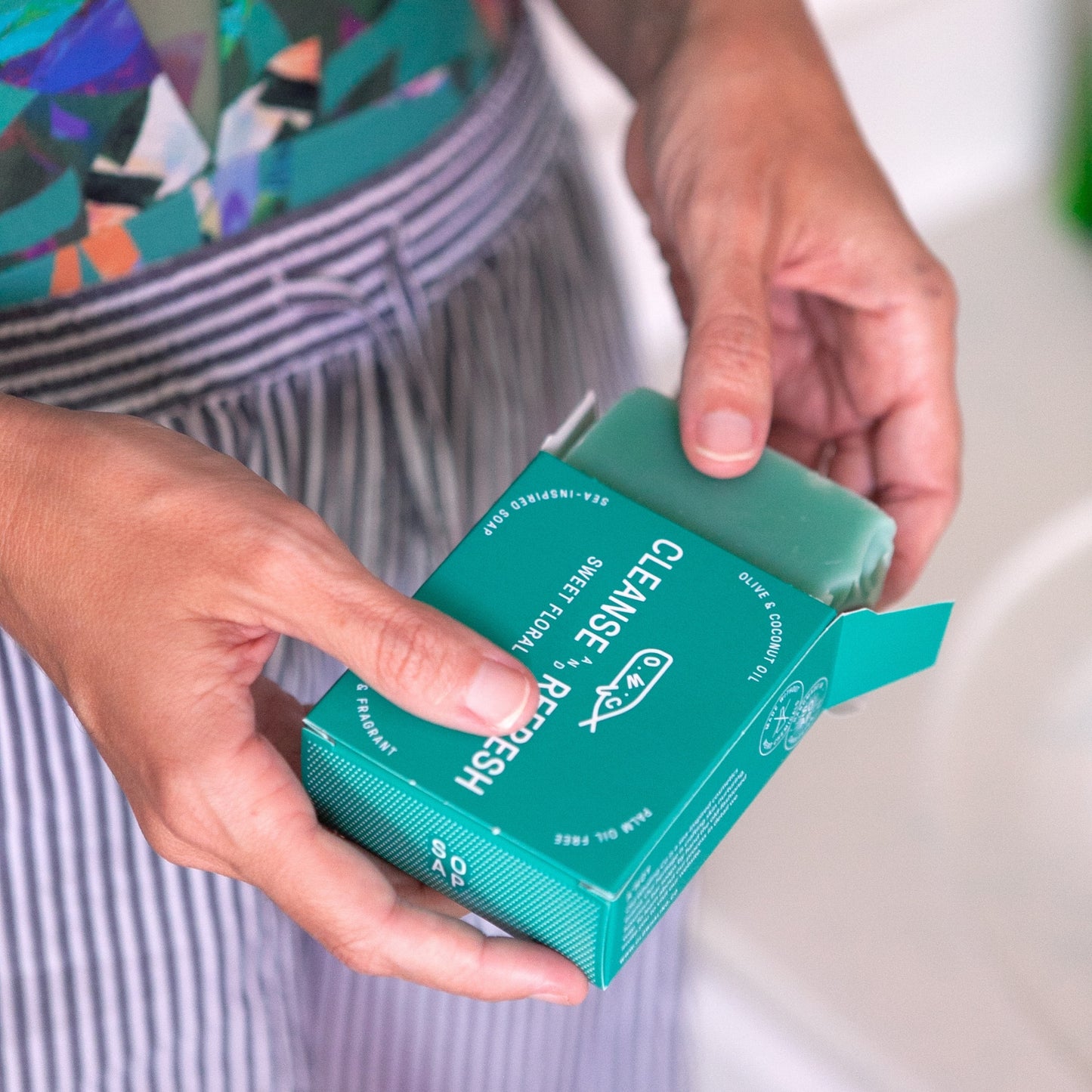 Hands unboxing Sea La Vie Bar Soap