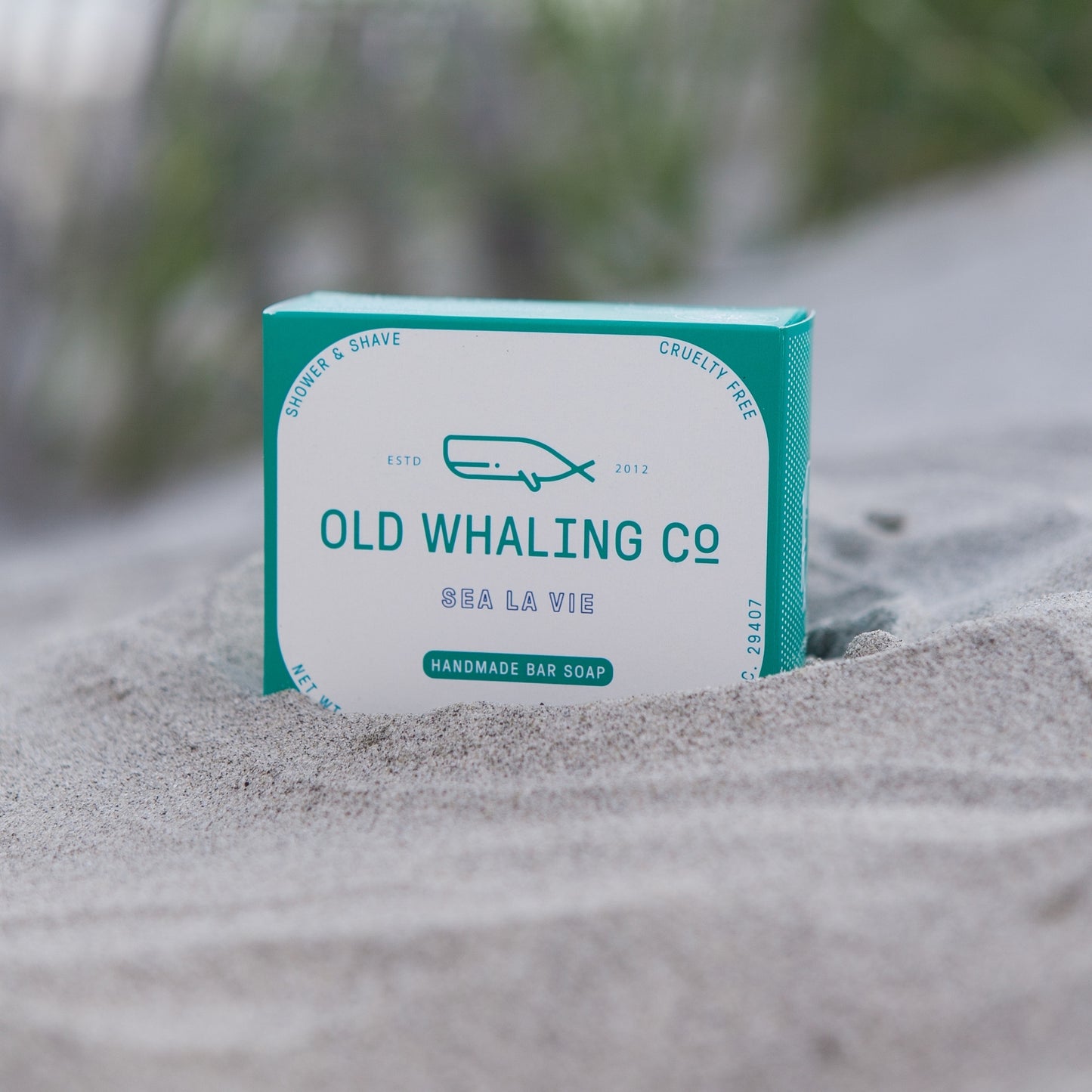 Sea La Vie Bar Soap box sits in sand