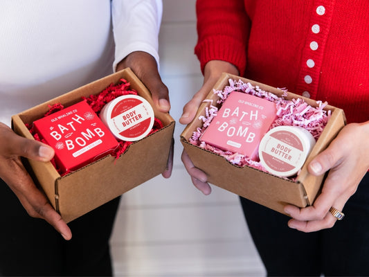 Old Whaling Company Simple & Sweet Gift boxes held by two people in fulfillment warehouse in Charleston, SC