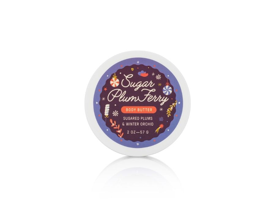 Jar of Sugar Plum Ferry body butter on a white background