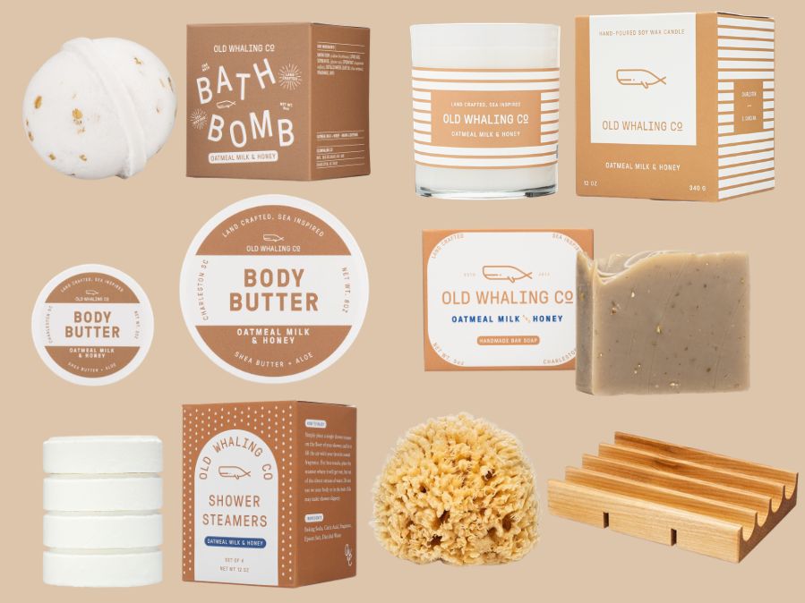 Deluxe collection of Old Whaling Co  Oatmeal Milk & Honey skincare and bath products on a beige background