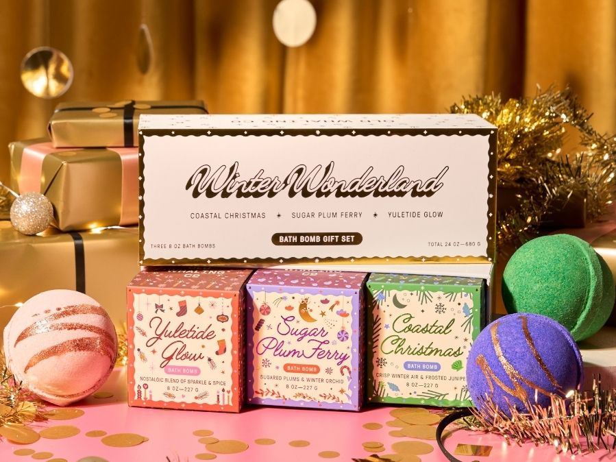 Bath bomb gift set with 'Winter Wonderland' packaging on a festive background.