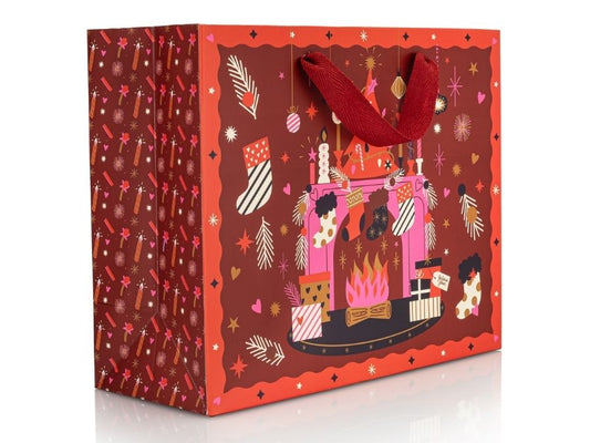 Decorative gift bag with festive design on a white background